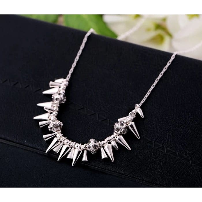 Spikey statement layering necklace with smokey crystal 