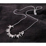 Spikey statement layering necklace with smokey crystal 