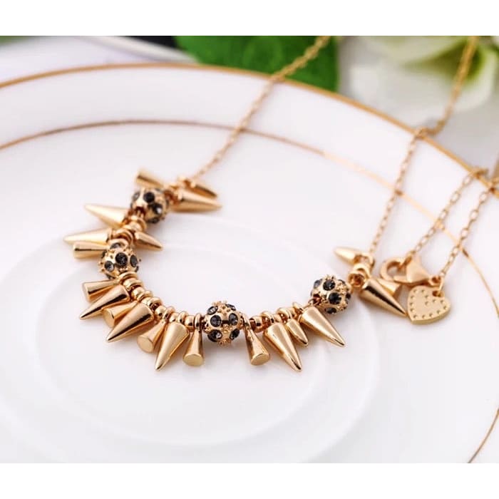 Spikey statement layering necklace with smokey crystal 